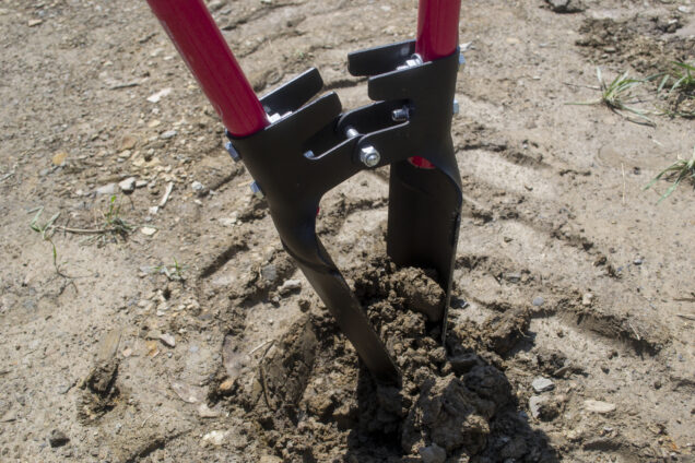 Post hole digger in action