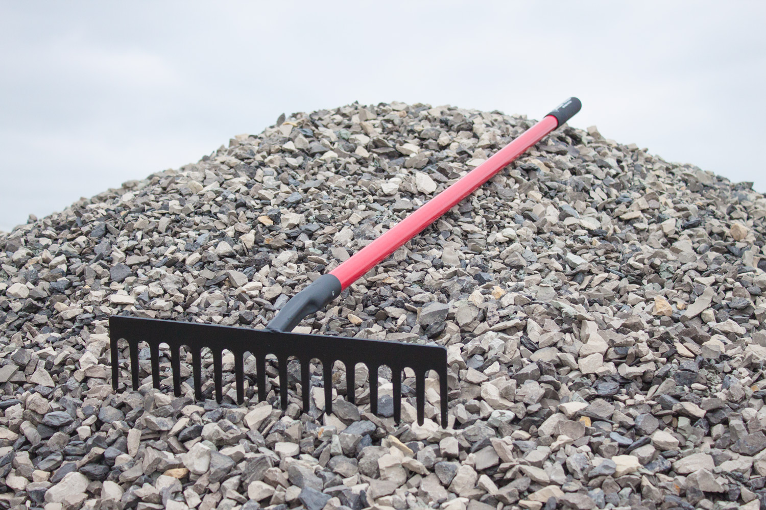 stone-rake-pile-01 18" Stone Rake in pile of stones 1