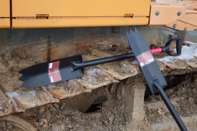 Track shovels laying down on tracks