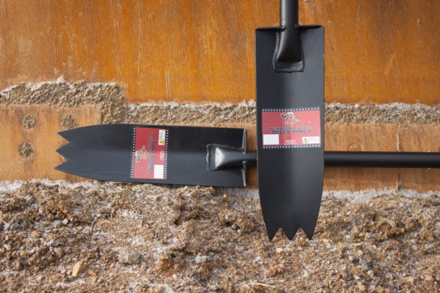 Track shovels leaning