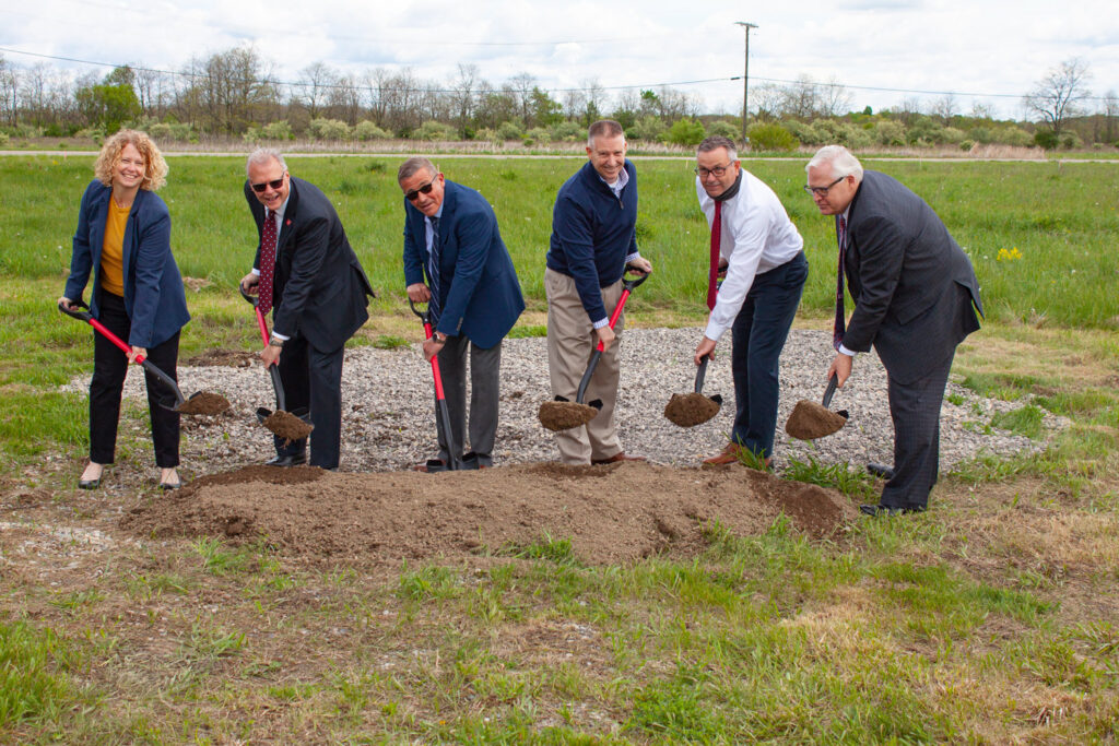 Ground breaking ceremony pose