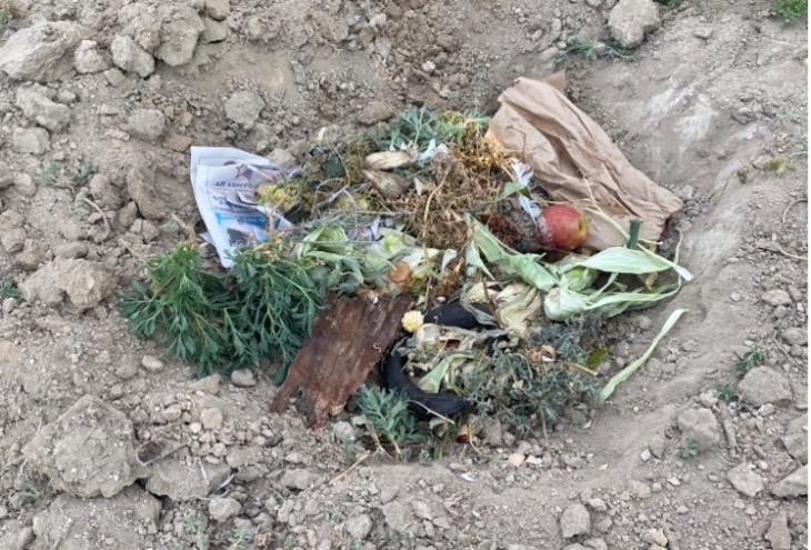 in-ground compost area